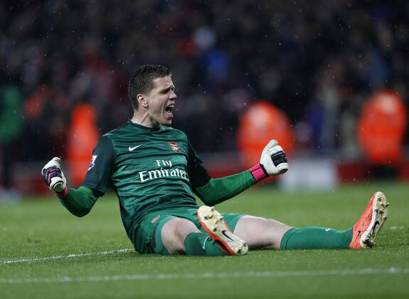 Arsenal s Wojciech Szczesny celebrates his sides second goal - Barclays Premier League - Arsenal vs Wigan - Emirates Stadium - London - 14 05 2013 - Pic David Klein Sportimage EDITORIAL USE ONLY. No use with unauthorised audio, video, data, fixture lists, club league logos or live services. Online in-match use limited to 120 images, no video emulation. No use in betting, games or single club league player publications.