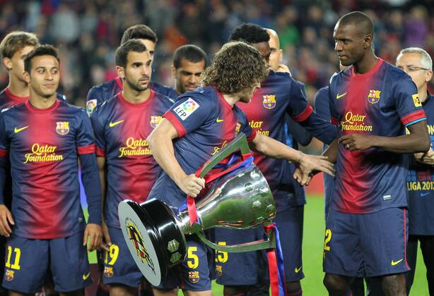 Carles PUYOL (Barcelona) - eric abidal FOOTBALL : FC Barcelona (Barca) Champion Primera Division 2012 2013 - Liga - 19 05 2013 PACOLARGO 