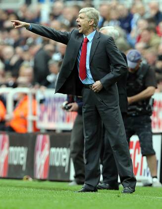 Football - English Premiership - Newcastle v Arsenal Arsene Wenger of Arsenal gestures during the Newcastle v Arsenal, Barclay s Premier League football match at St James Park, Newcastle. Colorsport 19th May 2013