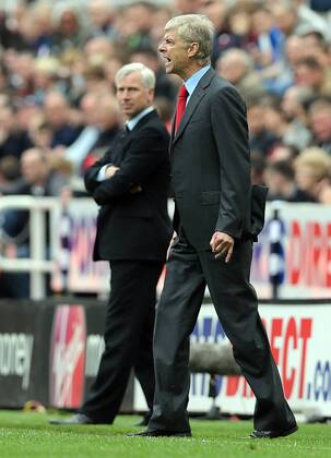 Football - English Premiership - Newcastle v Arsenal Arsene Wenger of Arsenal gestures during the Newcastle v Arsenal, Barclay s Premier League football match at St James Park, Newcastle. Colorsport 19th May 2013