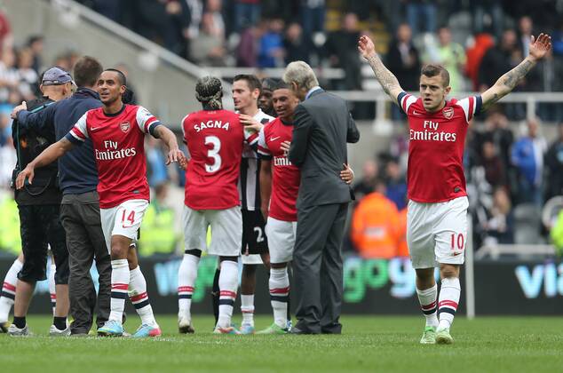 Football - English Premiership - Newcastle v Arsenal Arsesnal players celebrate securing Champions League football during the Newcastle v Arsenal, Barclay s Premier League football match at St James Park, Newcastle. Colorsport 19th May 2013 