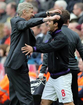Football - English Premiership - Newcastle v Arsenal Arsene Wenger of Arsenal and Mikel Arteta celebrate during the Newcastle v Arsenal, Barclay s Premier League football match at St James Park, Newcastle. Colorsport 19th May 2013 