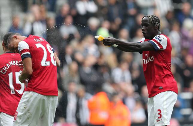 Kieran Gibbs, Bacary Sagna - Football - English Premiership - Newcastle United v Arsenal FC Arsesnal player Bacary Sagna celebrates securing Champions League football during the Newcastle United v Arsenal FC , Barclay s Premier League football match at St James Park, Newcastle. Colorsport 19th May 2013 