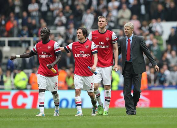 Bacary Sagna, Tomas Rosicky, Per Mertesacker, Arsene Wenger - Football - English Premiership - Newcastle United v Arsenal FC Arsesnal player celebrates securing Champions League football during the Newcastle United v Arsenal FC , Barclay s Premier League football match at St James Park, Newcastle. Colorsport 19th May 2013 