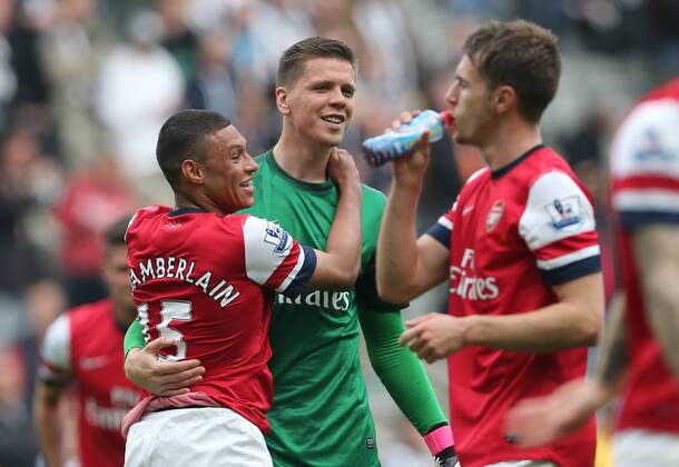 Alex Oxlade-Chamberlain, Wojciech Szczesny Football - English Premiership - Newcastle United v Arsenal FC Arsesnal player celebrates securing Champions League football during the Newcastle United v Arsenal FC , Barclay s Premier League football match at St James Park, Newcastle. Colorsport 19th May 2013 