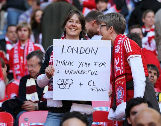 A Munich fan with a banner thanking London - FC Bayern Munich - UEFA Champions League Final - Wembley Stadium - London - England -25 05 2013 - EDITORIAL USE ONLY. No use with unauthorised audio, video, data, fixture lists, club league logos or live services. Online in-match use limited to 120 images, no video emulation. No use in betting, games or single club league player publications.