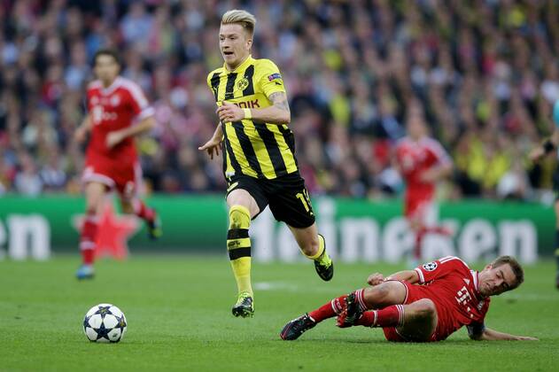Marco REUS (Borussia Dortmund - BVB - 11) - im Zweikampf mit Philipp LAHM (FC Bayern München - 21) EP_GST