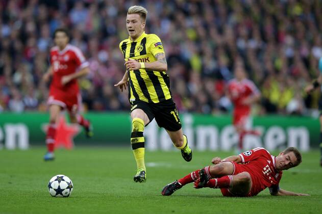 Marco REUS (Borussia Dortmund - BVB - 11) - im Zweikampf mit Philipp LAHM (FC Bayern München - 21) EP_GST