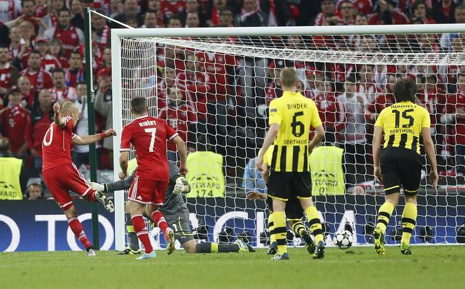 Munich s Arjen Robben scoring his sides second goal - Borussia Dortmund vs Bayern Munich - UEFA Champions League Final - Wembley Stadium - London - England -25 05 2013 - EDITORIAL USE ONLY. No use with unauthorised audio, video, data, fixture lists, club league logos or live services. Online in-match use limited to 120 images, no video emulation. No use in betting, games or single club league player publications.