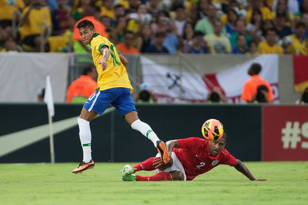 Football - International Friendly - Brazil vs. England Glen Johnson of England challenges Neymar of Brazil at the Maracana Stadium, Rio de Janeiro