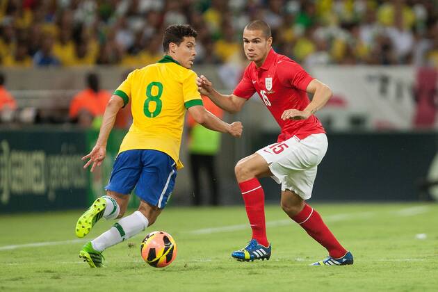 Football - International Friendly - Brazil vs. England Jack Rodwell of England steals the ball from Anderson Hernanes of Brazil at the Maracana Stadium, Rio de Janeiro