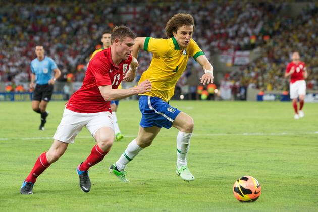 Football - International Friendly - Brazil vs. England James Milner of England and David Luiz of Brazil at the Maracana Stadium, Rio de Janeiro