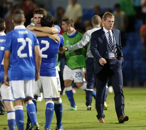 England s Stuart Pearce looks on dejected at the final whistle - England U21 vs Italy U21 - UEFA U21 Championship 2013 - Bloomfield Stadium - Tel Aviv - Israel - 05 06 2013 - Pic David Klein Sportimage EDITORIAL USE ONLY. No use with unauthorised audio, video, data, fixture lists, club league logos or live services. Online in-match use limited to 120 images, no video emulation. No use in betting, games or single club league player publications.