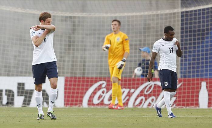 England s Craig Dawson and Danny Rose look on dejected after going 1-0 down - England U21 vs Norway U21 - UEFA U21 Championship 2013 - Ha Moshava Stadium - Petah Tikva - Israel - 08 06 2013 - Pic David Klein Sportimage EDITORIAL USE ONLY. No use with unauthorised audio, video, data, fixture lists, club league logos or live services. Online in-match use limited to 120 images, no video emulation. No use in betting, games or single club league player publications.