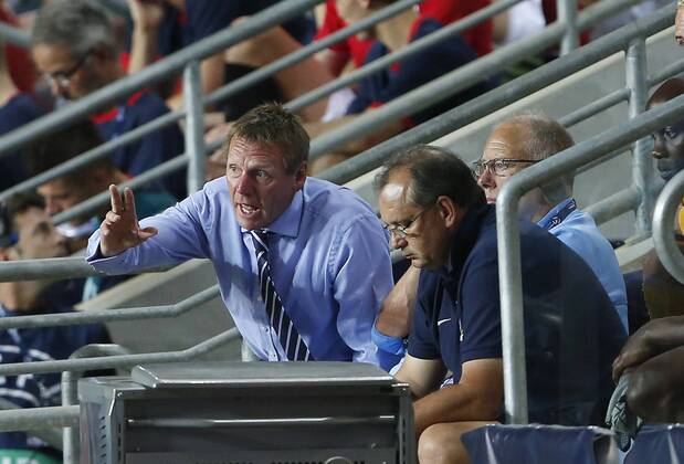 England s Stuart Pearce looks on dejected - England U21 vs Norway U21 - UEFA U21 Championship 2013 - Ha Moshava Stadium - Petah Tikva - Israel - 08 06 2013 - Pic David Klein Sportimage EDITORIAL USE ONLY. No use with unauthorised audio, video, data, fixture lists, club league logos or live services. Online in-match use limited to 120 images, no video emulation. No use in betting, games or single club league player publications.