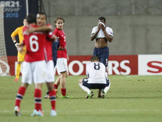 England s Andre Wisdom looks on dejected at the final whistle - England U21 vs Norway U21 - UEFA U21 Championship 2013 - Ha Moshava Stadium - Petah Tikva - Israel - 08 06 2013 - Pic David Klein Sportimage EDITORIAL USE ONLY. No use with unauthorised audio, video, data, fixture lists, club league logos or live services. Online in-match use limited to 120 images, no video emulation. No use in betting, games or single club league player publications.
