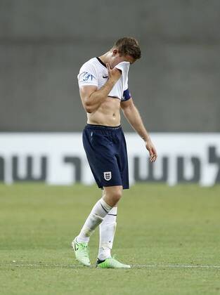 England s Jordan Henderson looks on dejected at the final whistle - England U21 vs Norway U21 - UEFA U21 Championship 2013 - Ha Moshava Stadium - Petah Tikva - Israel - 08 06 2013 - Pic David Klein Sportimage EDITORIAL USE ONLY. No use with unauthorised audio, video, data, fixture lists, club league logos or live services. Online in-match use limited to 120 images, no video emulation. No use in betting, games or single club league player publications.