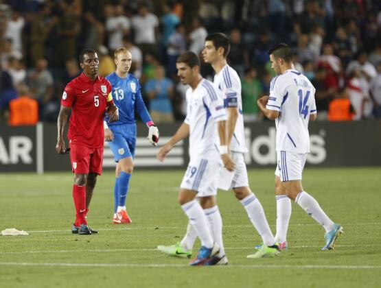 England s Andre Wisdom looks on dejected at the final whistle - Israel U21 vs England U21 - UEFA U21 Championship 2013 - Teddy Stadium - Jerusalem - Israel - 11 06 2013 - Pic David Klein Sportimage EDITORIAL USE ONLY. No use with unauthorised audio, video, data, fixture lists, club league logos or live services. Online in-match use limited to 120 images, no video emulation. No use in betting, games or single club league player publications.