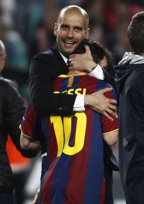 Second match of 1 2 Champions League. In this picture, Pep Guardiola and Lionel Messi (FC Barcelona) celebrate the victory. xFRANCESCxADELANTADOx 