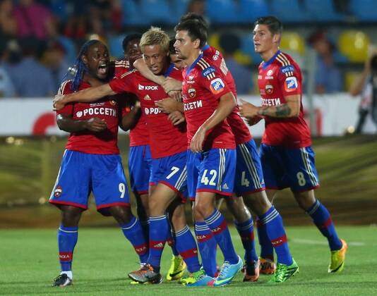 ITAR-TASS: ROSTOV-ON-DON, RUSSIA. JULY 13, 2013. CSKA s Keisuke Honda (C) celebrates as he scores in a match for the Russian Football Super Cup against Zenit St. Petersburg at the Olimp-2 Stadium. FC CSKA won the game 3:0.  RE121BD7