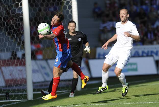 Opening match of Champions League, 2nd preliminary round, Viktoria Plzen vs FK Zeljeznicar Sarajevo in Pilsen, Czech Republic, July 16, 2013. Milan Petrzela (left) of Viktoria Plzen and Mladen Zelkovic of Sarajevo. (CTKxPhoto PetrxEret) CTKPhotoP201307160687701  ert 2