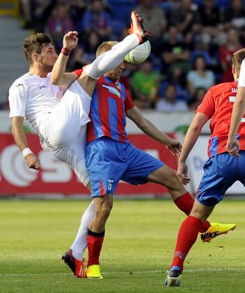 Opening match of Champions League, 2nd preliminary round, Viktoria Plzen vs FK Zeljeznicar Sarajevo in Pilsen, Czech Republic, July 16, 2013. Daniel Kolar (right) of Viktoria and Eldin Adilovic (left) of Sarajevo. (CTKxPhoto PetrxEret) CTKPhotoP201307160762401  ert 8