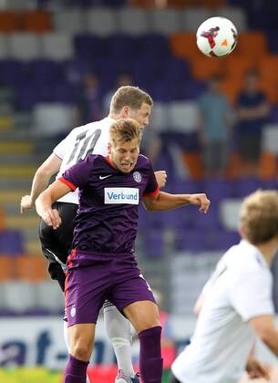 FUSSBALL - CL Quali, A.Wien vs Hafnarfjoerdur WIEN,AUSTRIA,30.JUL.13 - FUSSBALL - UEFA Champions League, Qualifikation, FK Austria Wien vs FH Hafnarfjoerdur. Bild zeigt Bjoern Sverrisson (Hafnarfjoerdur) und Thomas Jun (A.Wien). 
