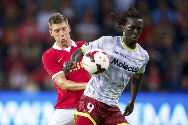 (L-R) Stijn Schaars of PSV, Mbaye Leye of sv Zulte Waregem PSV v SV Zulte Waregem Qualifier Champions League 2013 2014 xVIxxIVx 1695279