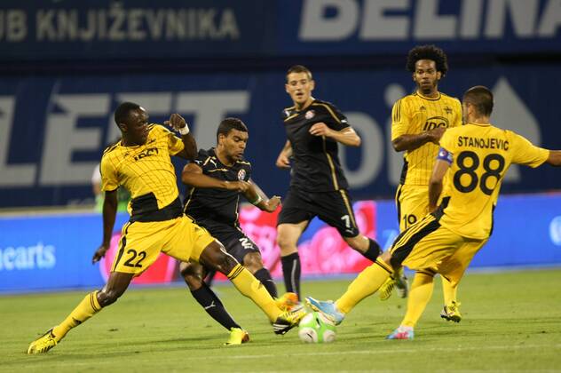Zagreb, 30.7.2013. - UEFA Champions League 2013 2014, Third Qualifying Round, Stadium Maksimir. GNK Dinamo (blue) - FC Sheriff (yellow). El Arabi Hilal Soudani vs Djibril Tamsir Paye and Marko Stanojevic GNK Dinamo - FC Sheriff