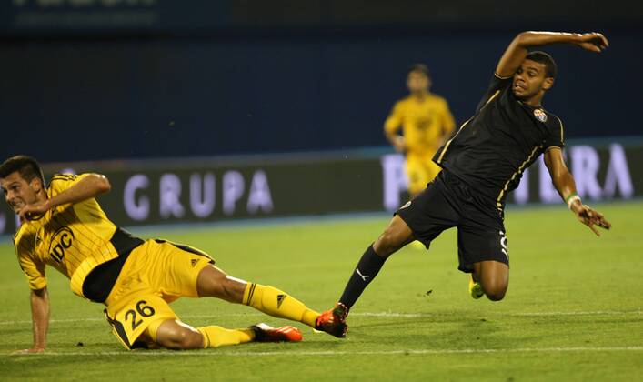 Zagreb, 30.7.2013. - UEFA Champions League 2013 2014, Third Qualifying Round, Stadium Maksimir. GNK Dinamo (blue) - FC Sheriff (yellow). El Arabi Hilal Soudani vs Miral Samardzic GNK Dinamo - FC Sheriff