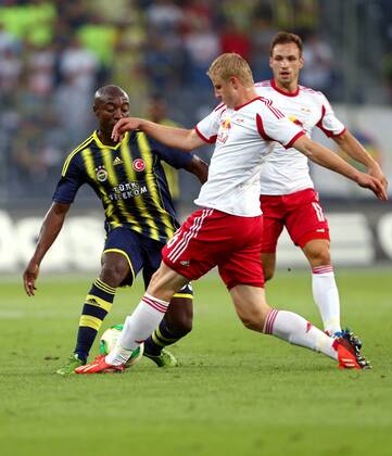 FUSSBALL - CL Quali, RBS vs Fenerbahce SALZBURG,AUSTRIA,31.JUL.13 - FUSSBALL - UEFA Champions League, Qualifikation, Red Bull Salzburg vs Fenerbahce Istanbul. Bild zeigt Pierre Webo (Fenerbahce) und Martin Hinteregger (RBS). 