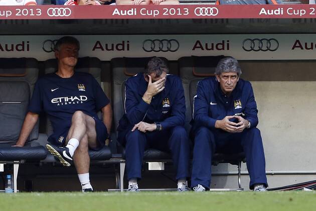 Manchester City s Manuel Pellegrini looks on AC Milan v Manchester City - Audi Cup - Allianz Arena - Munich - Germany -31 07 2013 - Pic David Klein Sportimage EDITORIAL USE ONLY. No use with unauthorised audio, video, data, fixture lists, club league logos or live services. Online in-match use limited to 120 images, no video emulation. No use in betting, games or single club league player publications.