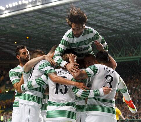 31.07.2013 Glasgow, Scotland. The Celtic players celebrate the opening goal during the UEFA Champions League Qualifying Third Round tie between Celtic Glasgow and IF Elsborg from Parkhead. xVagelisxGeorgarioux  ActionPlus11434348