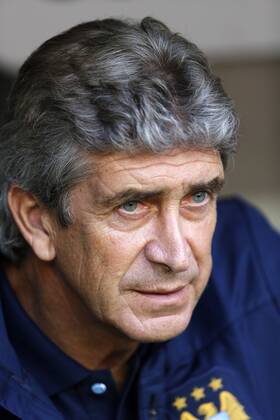 Manchester City s Manuel Pellegrini looks on AC Milan v Manchester City - Audi Cup - Allianz Arena - Munich - Germany -31 07 2013 - Pic David Klein Sportimage EDITORIAL USE ONLY. No use with unauthorised audio, video, data, fixture lists, club league logos or live services. Online in-match use limited to 120 images, no video emulation. No use in betting, games or single club league player publications.