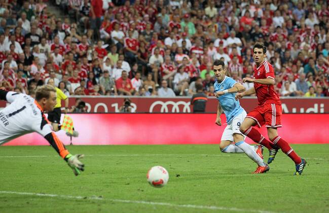 Manchester City s Alvaro Negredo scoring his sides opening goal Bayern Munich v Manchester City - Audi Cup - Allianz Arena - Munich - Germany -01 08 2013 - Pic David Klein Sportimage EDITORIAL USE ONLY. No use with unauthorised audio, video, data, fixture lists, club league logos or live services. Online in-match use limited to 120 images, no video emulation. No use in betting, games or single club league player publications.