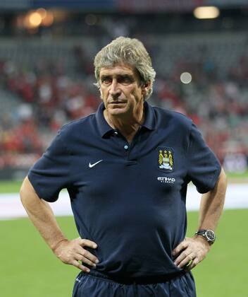 Manchester City s Manuel Pellegrini looks on dejecetd at the final whistle Bayern Munich v Manchester City - Audi Cup - Allianz Arena - Munich - Germany -01 08 2013 - Pic David Klein Sportimage EDITORIAL USE ONLY. No use with unauthorised audio, video, data, fixture lists, club league logos or live services. Online in-match use limited to 120 images, no video emulation. No use in betting, games or single club league player publications.