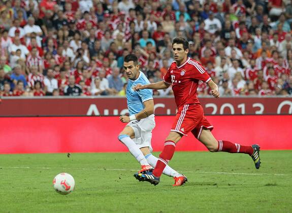 Manchester City s Alvaro Negredo scoring his sides opening goal Bayern Munich v Manchester City - Audi Cup - Allianz Arena - Munich - Germany -01 08 2013 - Pic David Klein Sportimage EDITORIAL USE ONLY. No use with unauthorised audio, video, data, fixture lists, club league logos or live services. Online in-match use limited to 120 images, no video emulation. No use in betting, games or single club league player publications.