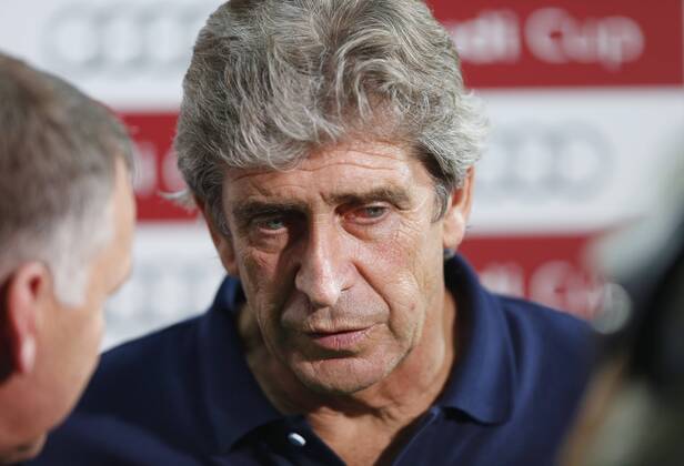 Manchester City s Manuel Pellegrini looks on Bayern Munich v Manchester City - Audi Cup - Allianz Arena - Munich - Germany -01 08 2013 - Pic David Klein Sportimage EDITORIAL USE ONLY. No use with unauthorised audio, video, data, fixture lists, club league logos or live services. Online in-match use limited to 120 images, no video emulation. No use in betting, games or single club league player publications.