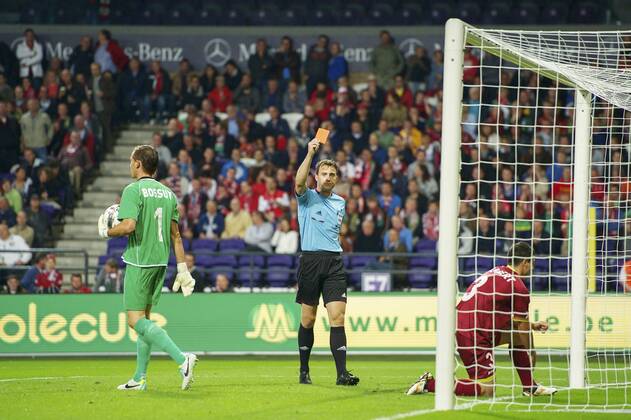 (L-R) goalkeeper Sammy Bossut of sv Zulte Waregem, referee Felix Zwayer, Steve Colpaert of sv Zulte Waregem SV Zulte Waregem v PSV Qualifier Champions League 2013 2014 xVIxxIVx 1711021