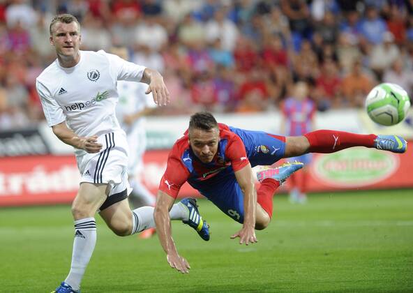 Second leg match of Champions League, 3nd preliminary round, FC Viktoria Plzen vs Nomme Kalju in Pilsen, Czech Republic, August 7, 2013. Stanislav Tecl (right) of Plzen and Andres Koogas of Kalju. (CTKxPhoto PetrxEret) CTKPhotoP201308070914301  ert 9