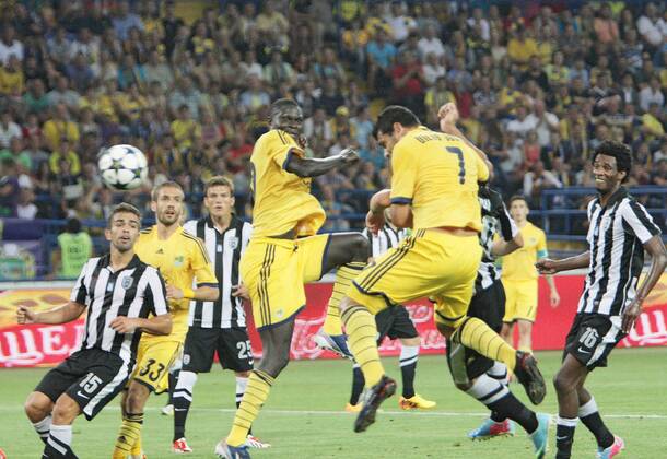 Players of FC Metalist Kharkiv (yellow kit) and PAOK FC vie for the ball during the UEFA Champions League third qualifying round second leg fixture at Metalist Stadium, Kharkiv, northeastern Ukraine, August 7, 2013. UKRINFORM. 