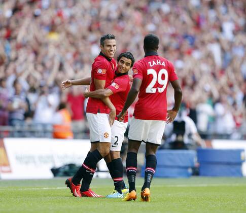 Manchester United s Robin Van Persie celebrates scoring his sides opening goal Manchester United v Wigan Athletic - FA Community Shield - Wembley - London - England -11 08 2013 - Pic David Klein Sportimage EDITORIAL USE ONLY. No use with unauthorised audio, video, data, fixture lists, club league logos or live services. Online in-match use limited to 120 images, no video emulation. No use in betting, games or single club league player publications.