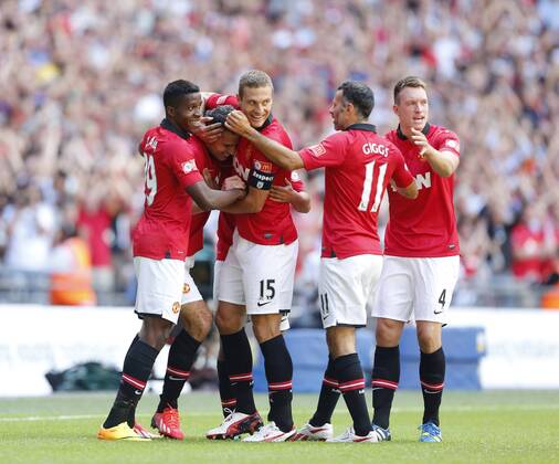Manchester United s Robin Van Persie celebrates scoring his sides opening goal Manchester United v Wigan Athletic - FA Community Shield - Wembley - London - England -11 08 2013 - Pic David Klein Sportimage EDITORIAL USE ONLY. No use with unauthorised audio, video, data, fixture lists, club league logos or live services. Online in-match use limited to 120 images, no video emulation. No use in betting, games or single club league player publications.