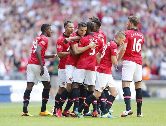 Manchester United s Robin Van Persie celebrates scoring his sides opening goal Manchester United v Wigan Athletic - FA Community Shield - Wembley - London - England -11 08 2013 - Pic David Klein Sportimage EDITORIAL USE ONLY. No use with unauthorised audio, video, data, fixture lists, club league logos or live services. Online in-match use limited to 120 images, no video emulation. No use in betting, games or single club league player publications.