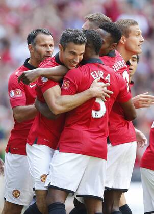 Manchester United s Robin Van Persie celebrates scoring his sides opening goal Manchester United v Wigan Athletic - FA Community Shield - Wembley - London - England -11 08 2013 - Pic David Klein Sportimage EDITORIAL USE ONLY. No use with unauthorised audio, video, data, fixture lists, club league logos or live services. Online in-match use limited to 120 images, no video emulation. No use in betting, games or single club league player publications.