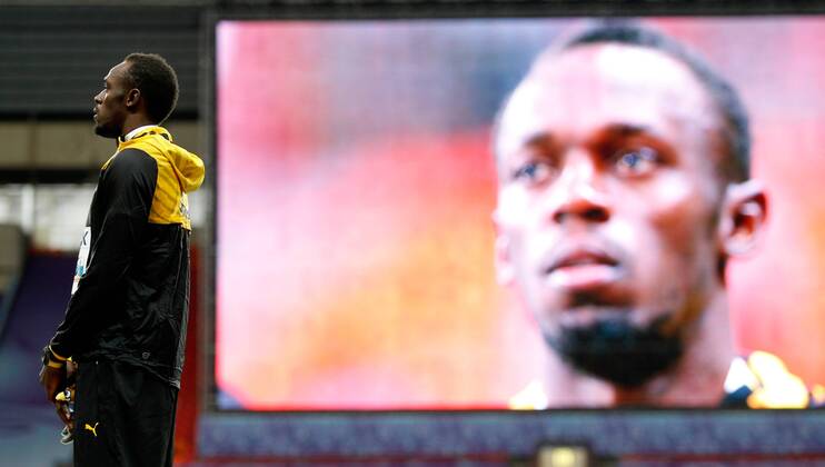 LEICHTATHLETIK - IAAF WM 2013 MOSKAU,RUSSLAND,12.AUG.13 - DIVERS, LEICHTATHLETIK - IAAF Weltmeisterschaften 2013, 100m der Herren, Siegerehrung. Bild zeigt Usain Bolt (JAM). 