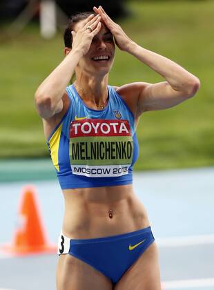 MOSCOW, Aug. 13, 2013 -- Ganna Melnichenko of Ukraine celebrates after the 800M competition of Women s Heptathlon in Day 4 of the 14th IAAF World Athletics Championships Moscow 2013 at Luzhniki Stadium in Moscow, Russia on Aug. 13, 2013. Ganna Melnichenko claimed the title with 6586 points. (Xinhua Wang Lili) (SP)RUSSIA-MOSCOW-ATHLETICS-IAAF WORLD CHAMPIONSHIPS 