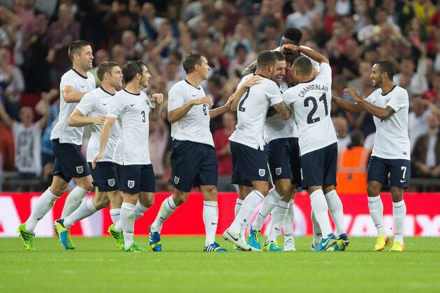 Rickie Lambert of England celebrates his goal with team mates - England v Scotland - International Friendly - Wembley Stadium - London - 13 08 2013 Pic Philip Oldham Sportimage EDITORIAL USE ONLY. No use with unauthorised audio, video, data, fixture lists, club league logos or live services. Online in-match use limited to 120 images, no video emulation. No use in betting, games or single club league player publications.