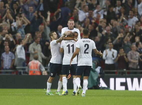 England s Theo Walcott celebrates scoring his sides opening goal England v Scotland - International Friendly - Wembley - London - England -14 08 2013 - Pic DavidxKlein Sportimage EDITORIAL USE ONLY. No use with unauthorised audio, video, data, fixture lists, club league logos or live services. Online in-match use limited to 120 images, no video emulation. No use in betting, games or single club league player publications.