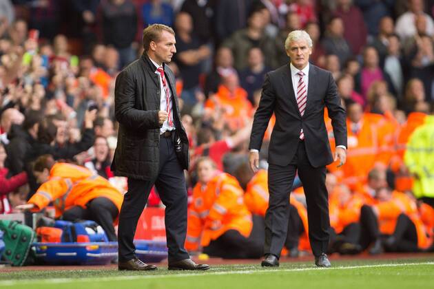 Manager of Liverpool, Brendan Rodgers pumps his fist in victory at full time - FC Liverpool vs. Stoke City FC - Premier League - Anfield - Liverpool - 17 08 2013 EDITORIAL USE ONLY. No use with unauthorised audio, video, data, fixture lists, club league logos or live services. Online in-match use limited to 120 images, no video emulation. No use in betting, games or single club league player publications.